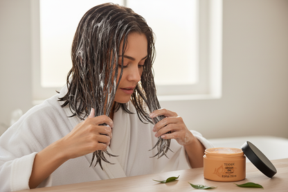 Working TEKNIA Argan Oil Treatment through hair - modest framing